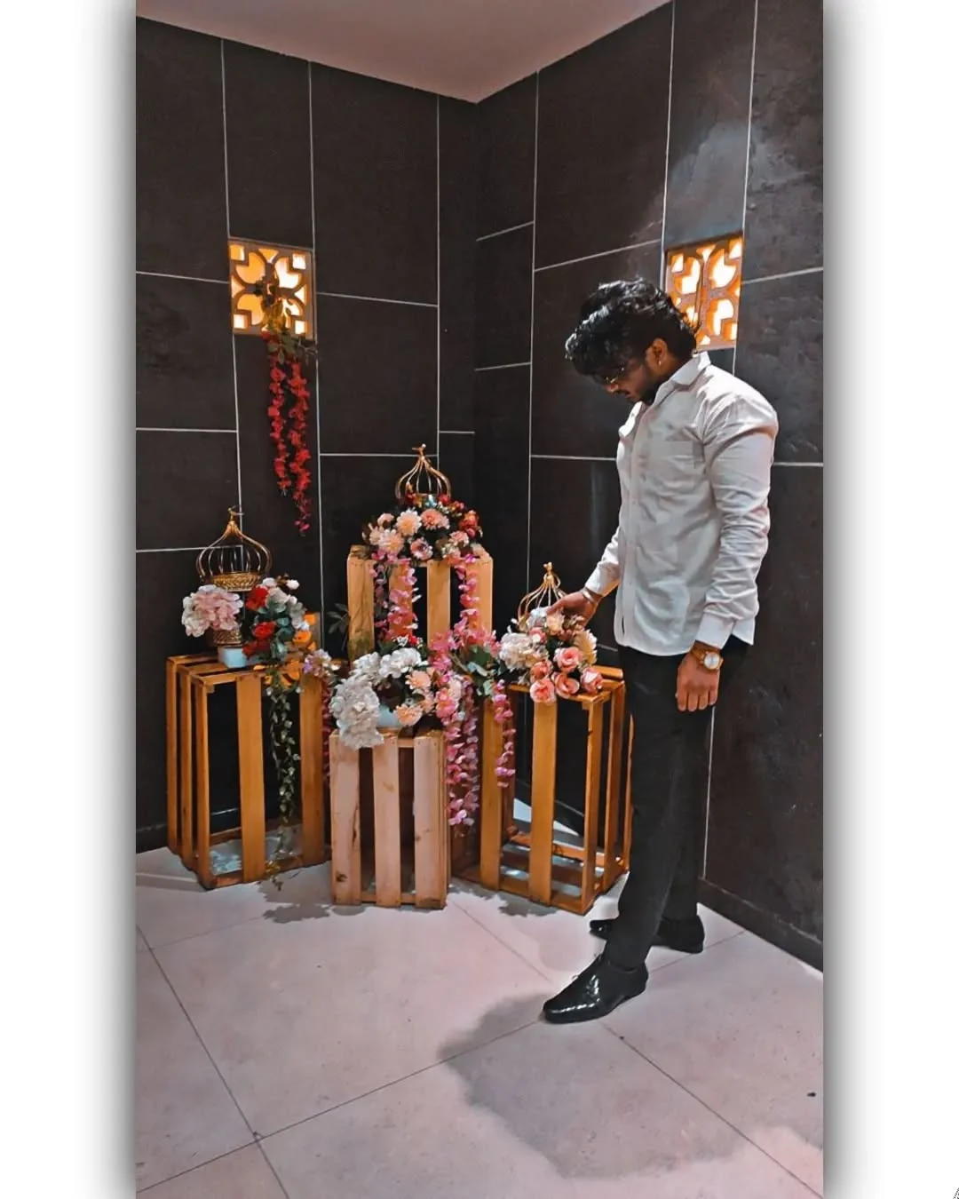 Mahendra Chiravande in formal attire at a decorated indoor venue