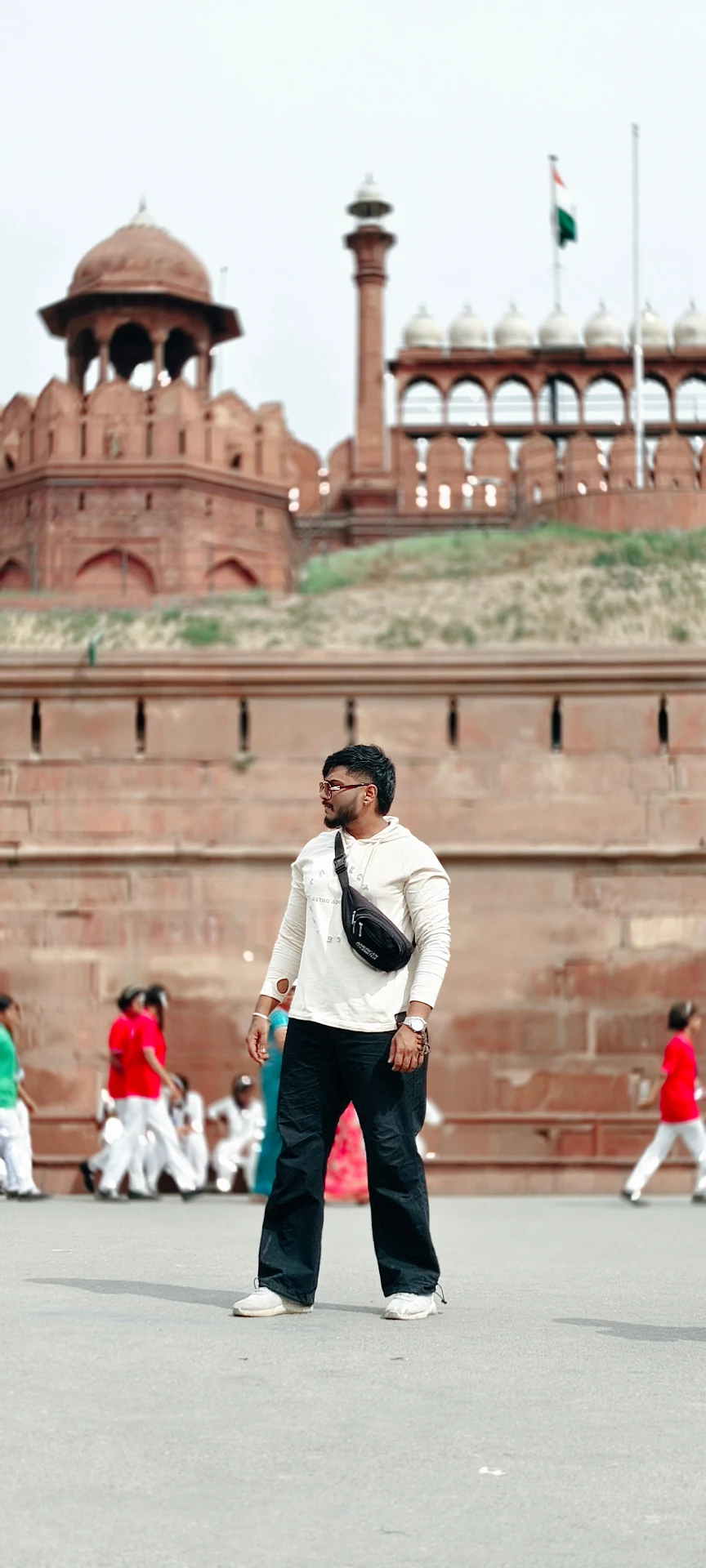 Mahendra Chiravande standing near the Red Fort historic landmark